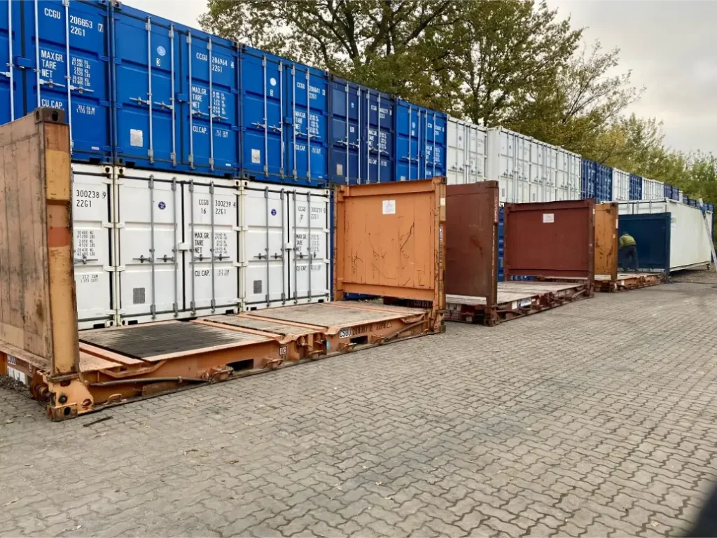 Used flat racks and open tops come up in supplier yards less often than standard containers, so allow lead time.